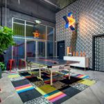 A Work Space With a Multi Color Carpet Space